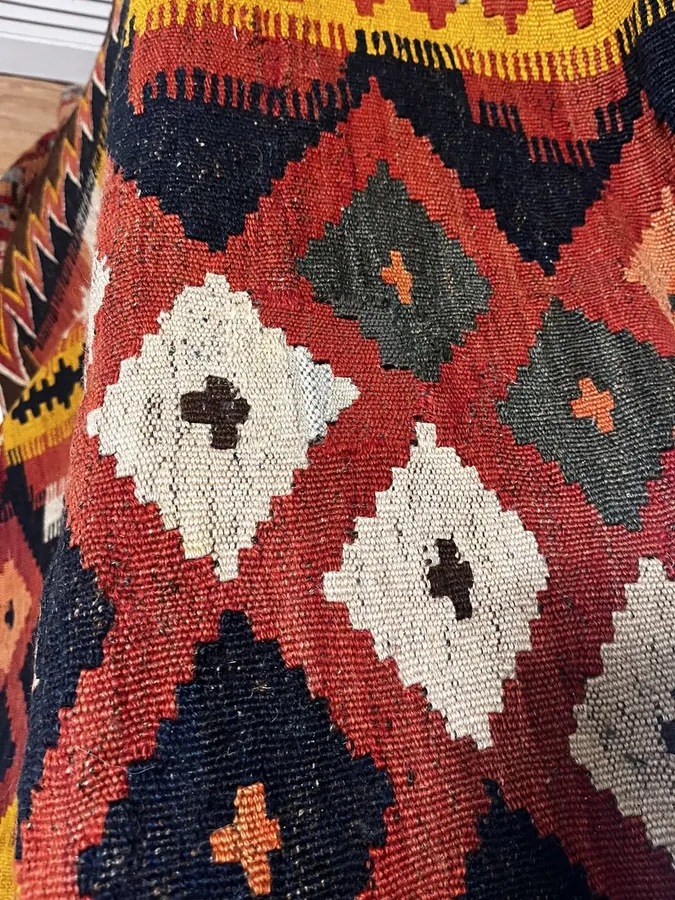 Kilim rug fully restored — vivid geometric pattern complete