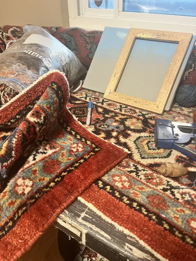 Same rug with corner fully rebuilt, seen in the workshop