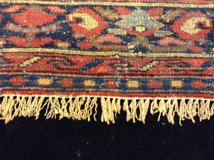 Same rug with fringe fully restored — clean, even, and uniform